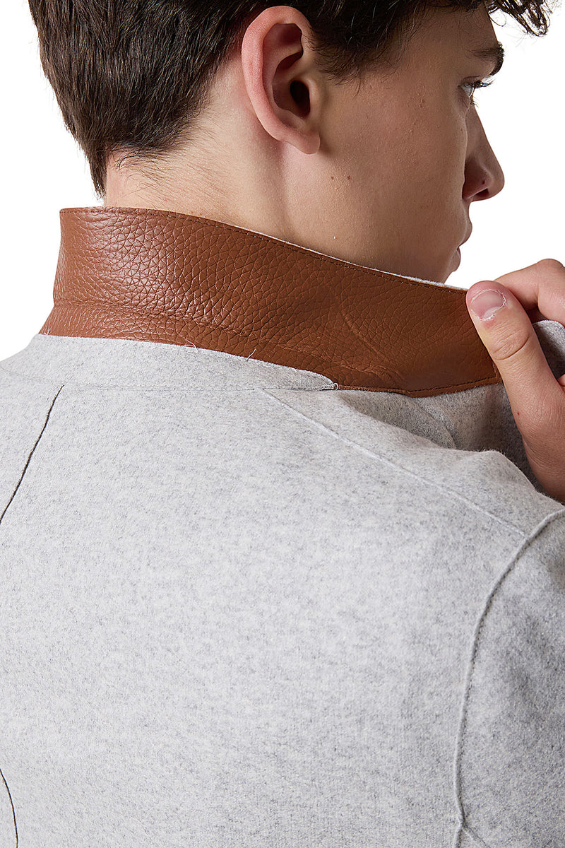 Double -breasted wool and leather jacket
